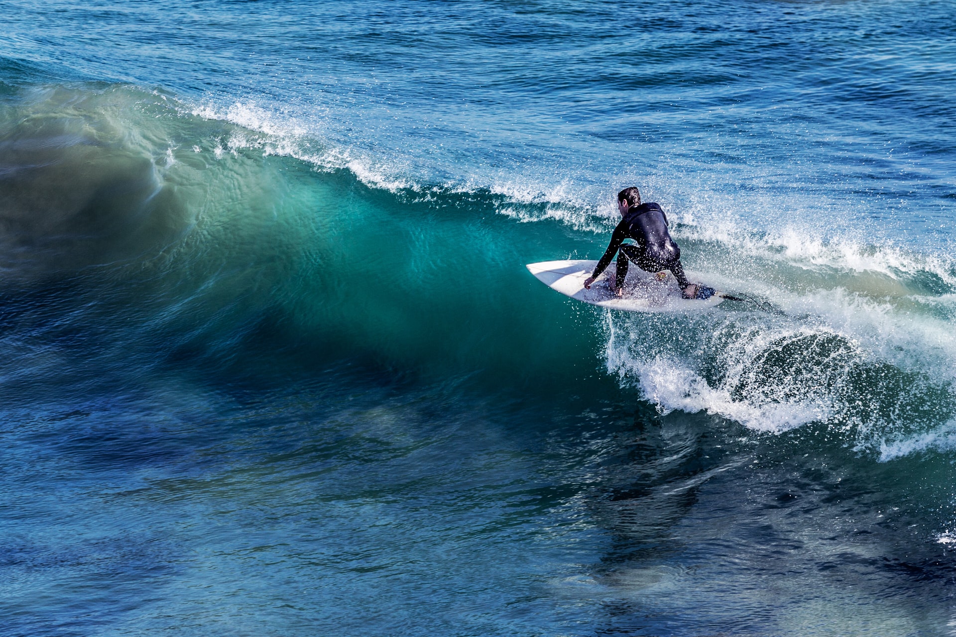 Should You Crouch While Surfing? (& Why It Improves Your Surfing)