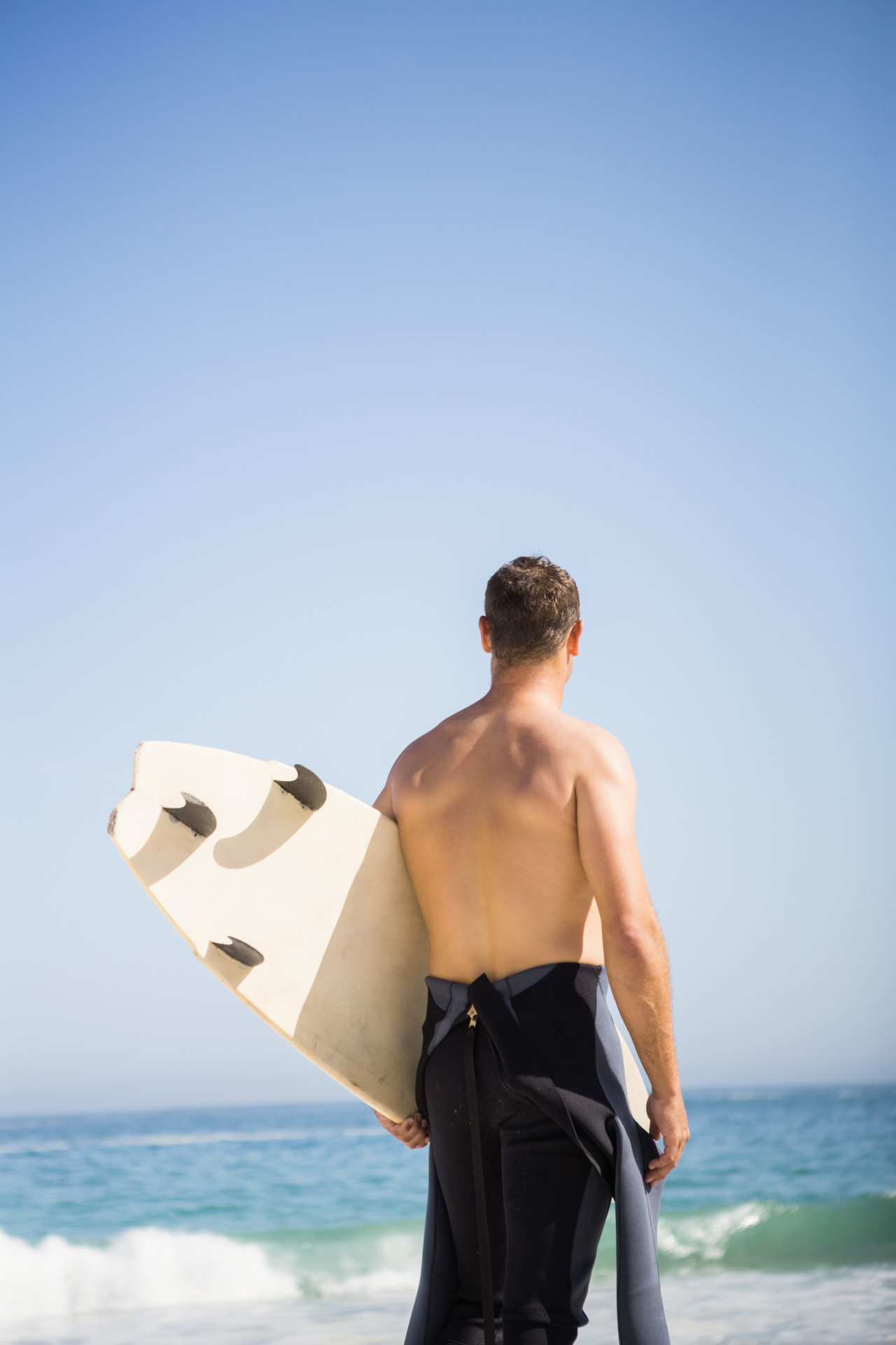 Do Surfers Wear Anything Under a Wetsuit